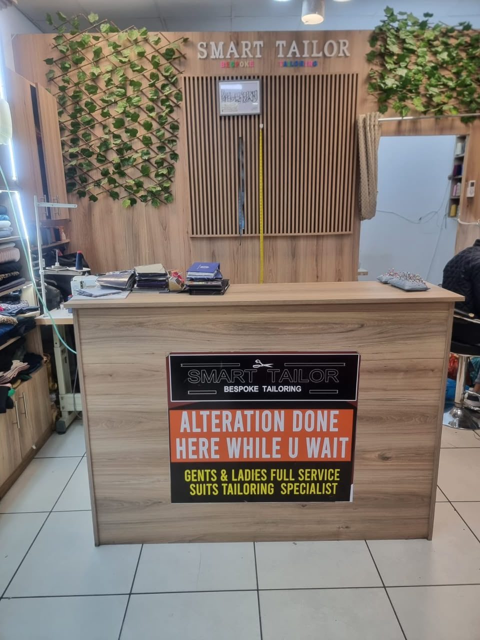 Smart Tailor workstation and counter where alterations are done on-site while you wait